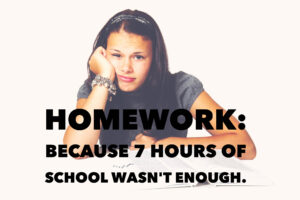 Teenage girl resting on her elbow doing homework.