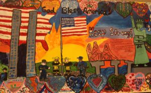 Mural of children's drawing of 9/11 with flag, US map, firefighters, & twin towers &